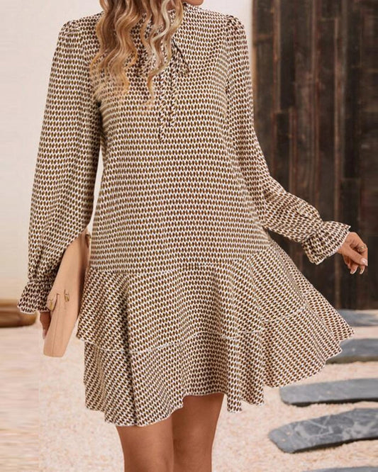 Modisches langärmeliges Kleid