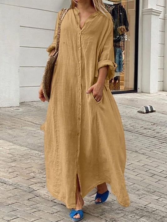 Lockeres, lässiges, einfarbiges Taschenkleid mit einer Knopfleiste und langen Ärmeln