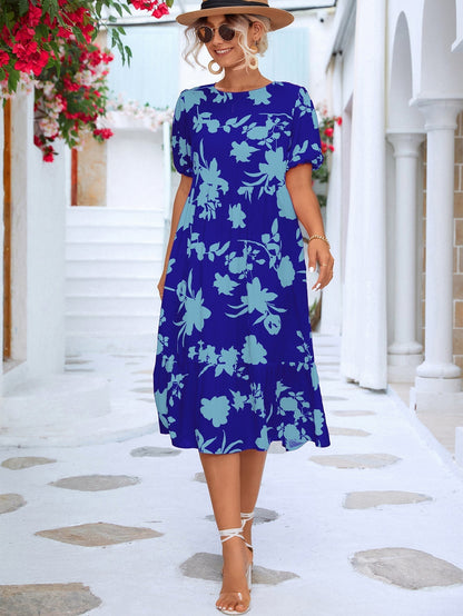 Chaya - Geblümtes Midikleid mit Puffärmeln und gerüschtem Saum