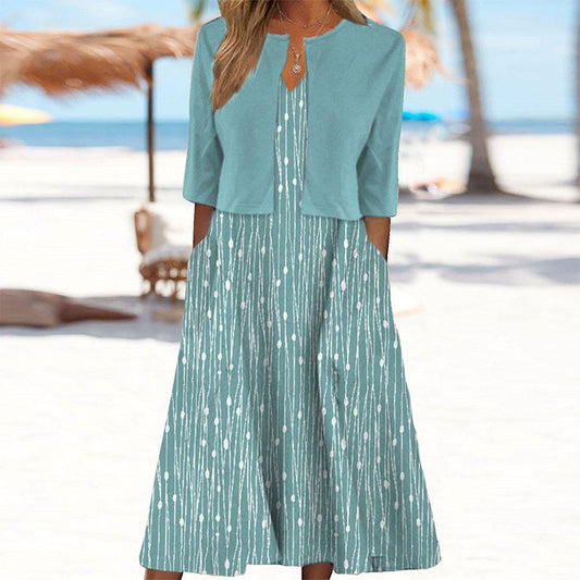 Midikleid mit Blattmuster und passendem Jackett für einen kompletten Look