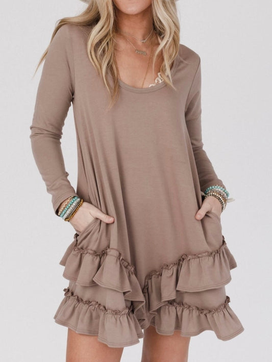 Das Kleid mit gerafftem Saum