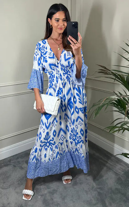 Langes Kleid mit V-Ausschnitt und Blumenprint in Blau und Weiß