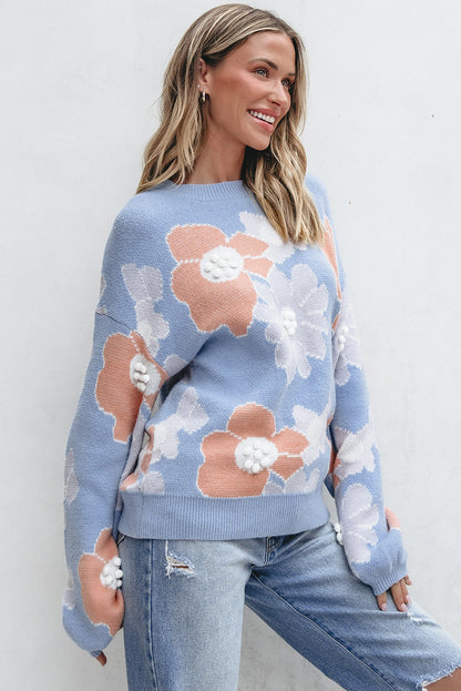 Blanche - Blauer Strickpullover mit Rundhalsausschnitt und Blumenmuster mit hängenden Schultern