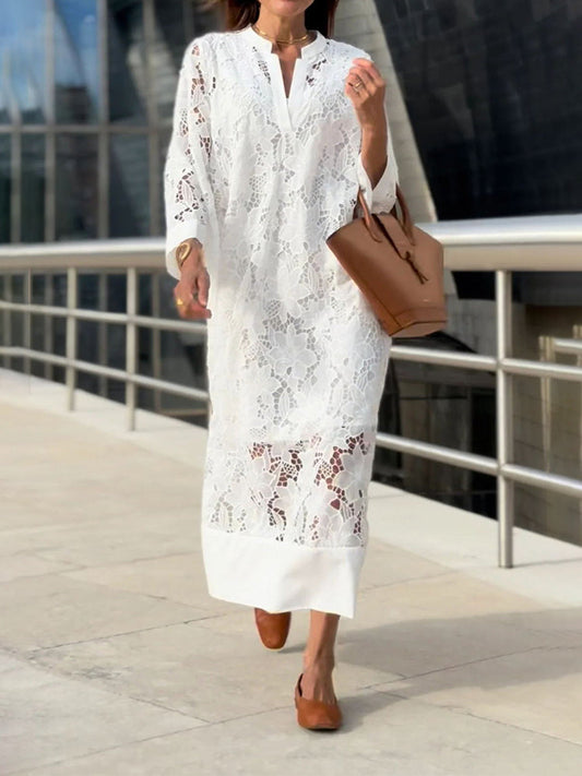 Elegantes langes Kleid mit langen Ärmeln und weitem Schnitt für besondere Anlässe