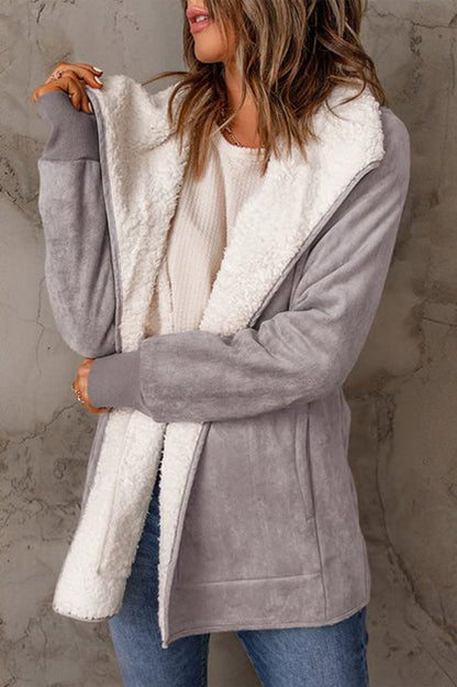 Elegante Daunenjacke mit langen Ärmeln und stilvollem Schnitt