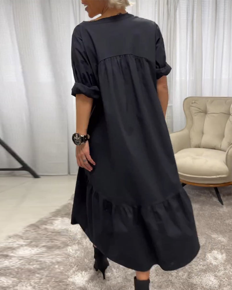 Kleid mit 3/4 Ärmeln und tiefem V-Ausschnitt