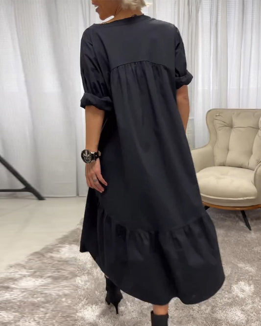 Kleid mit 3/4 Ärmeln und tiefem V-Ausschnitt