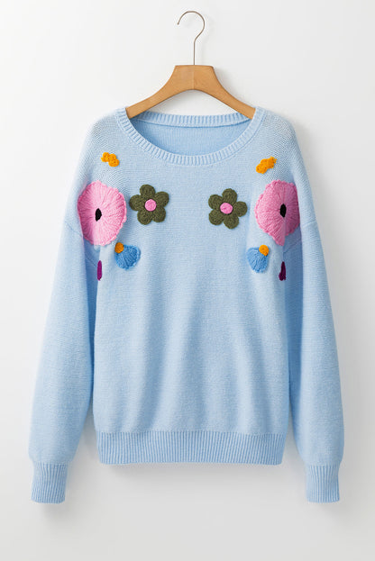 Anne - Strickpullover mit Blumenmuster und gerippten Kanten