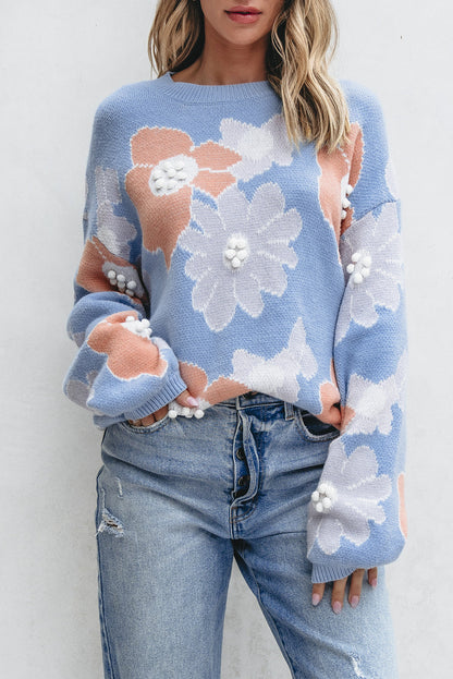 Blanche - Blauer Strickpullover mit Rundhalsausschnitt und Blumenmuster mit hängenden Schultern