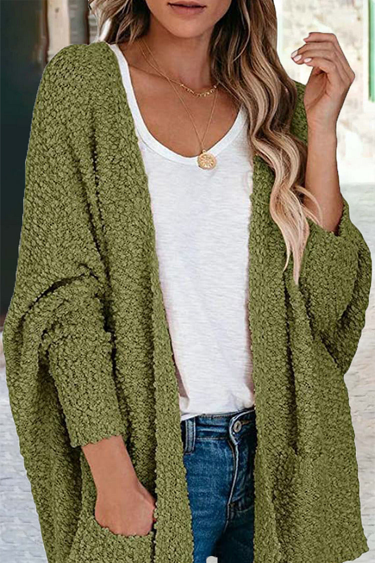 Kuschelige Strickjacke mit Puffärmeln für gemütliche Tage