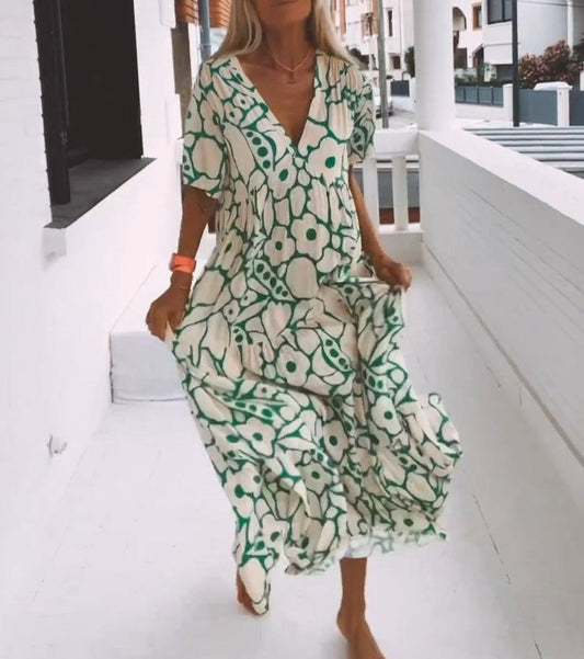 Elegantes Midikleid mit V-Ausschnitt und weichem Muster