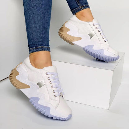Flache Turnschuhe für Frauen