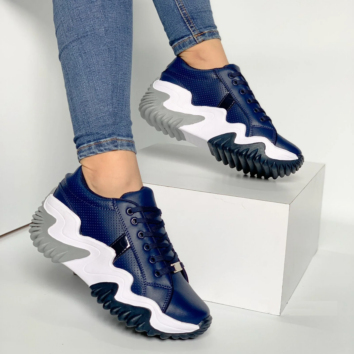 Flache Turnschuhe für Frauen