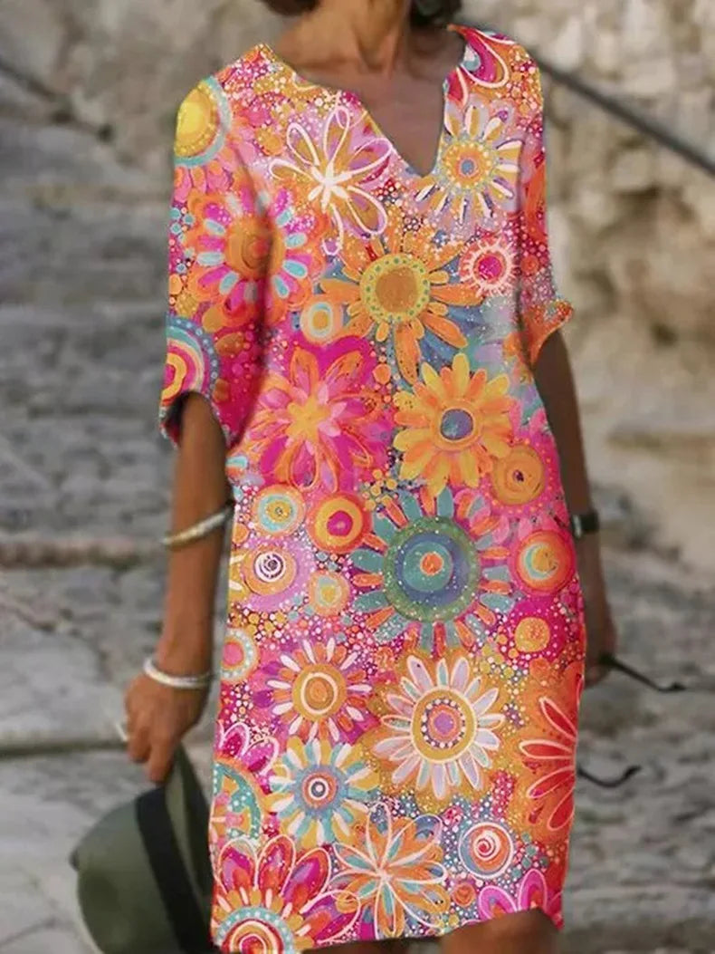 Midi-Kleid mit Blumenmuster, V-Ausschnitt und zeitloser Eleganz