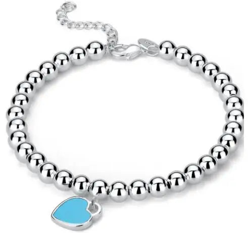 Silbernes Perlenarmband mit Herz-Anhänger | Mit dezentem Herz-Anhänger