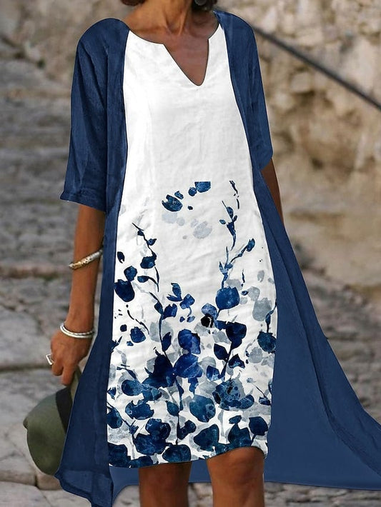 Nollie - Zweiteiliges Midikleid mit blauem Blumendruck und eleganten halben Ärmeln