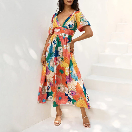 Langes Kleid mit Blumenprint und kurzen Puffärmeln