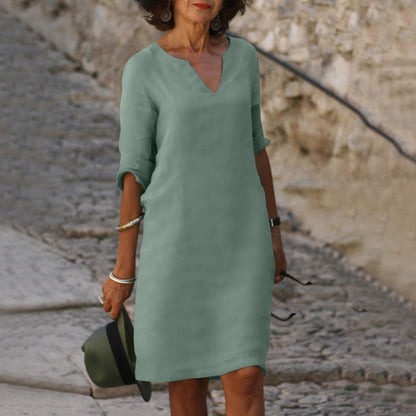Elegantes klassisches Kleid in Knielänge mit Dreiviertelärmeln