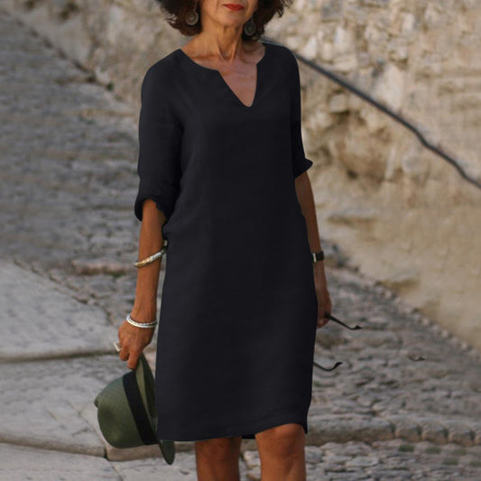 Elegantes klassisches Kleid in Knielänge mit Dreiviertelärmeln