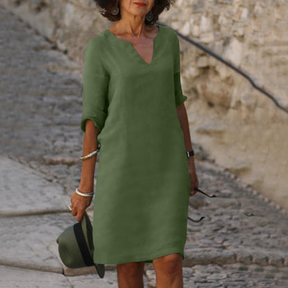 Elegantes klassisches Kleid in Knielänge mit Dreiviertelärmeln