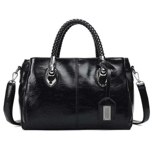 Iversen™ | Elegante Tasche mit geflochtenen Griffen