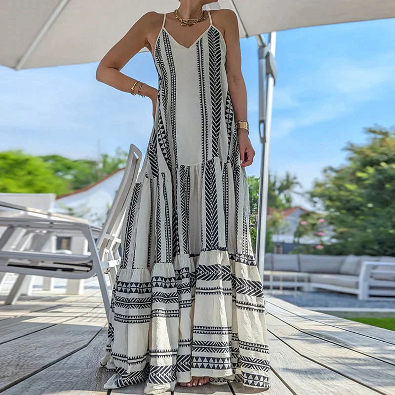 Debbie - Elegantes, ärmelloses Kleid mit Rüschen und lässigem Druck