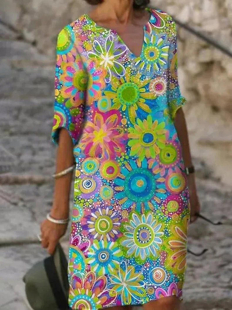 Midi-Kleid mit Blumenmuster, V-Ausschnitt und zeitloser Eleganz
