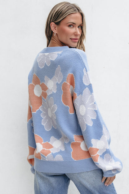 Blanche - Blauer Strickpullover mit Rundhalsausschnitt und Blumenmuster mit hängenden Schultern