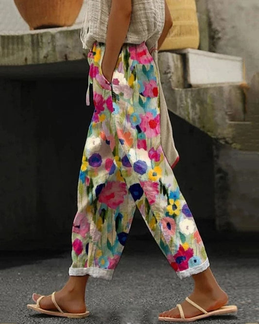 Sweatpants mit Taschen und buntem Blumendruck