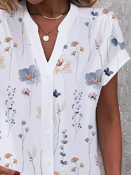 Linda - Lockere, lässige Bluse mit Blumen und Knöpfen