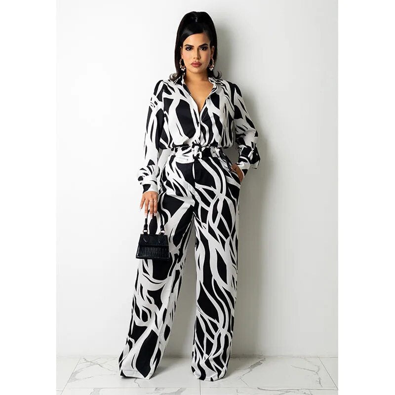 Selima - Damen-Jumpsuit mit Wellenstreifen, langen Ärmeln und weiten Beinen