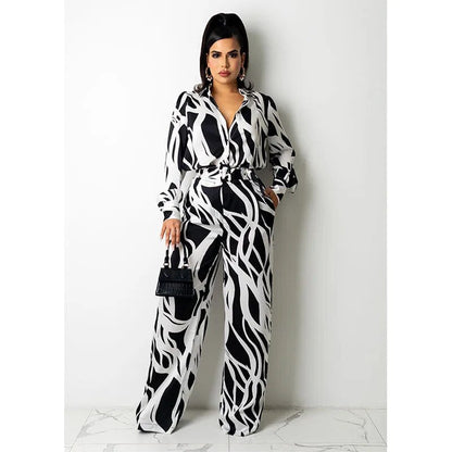 Selima - Damen-Jumpsuit mit Wellenstreifen, langen Ärmeln und weiten Beinen