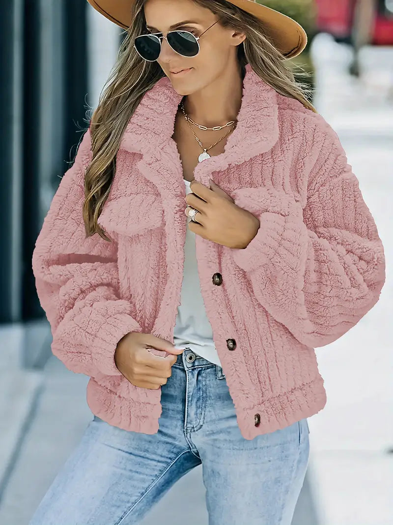 – Einfarbige Pelzjacke