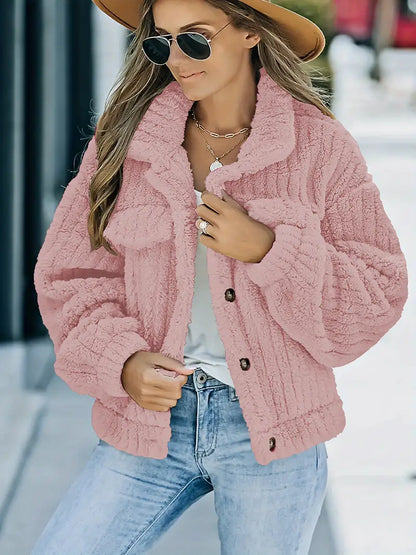 – Einfarbige Pelzjacke