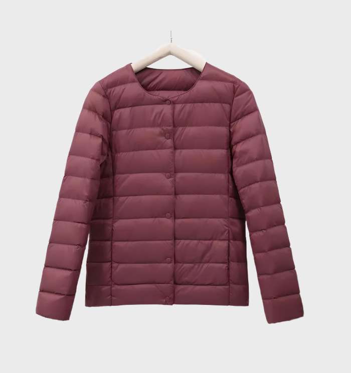 Einfarbige gesteppte Puffjacke mit Rundhalsausschnitt für Frauen