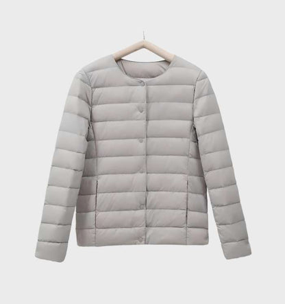 Einfarbige gesteppte Puffjacke mit Rundhalsausschnitt für Frauen