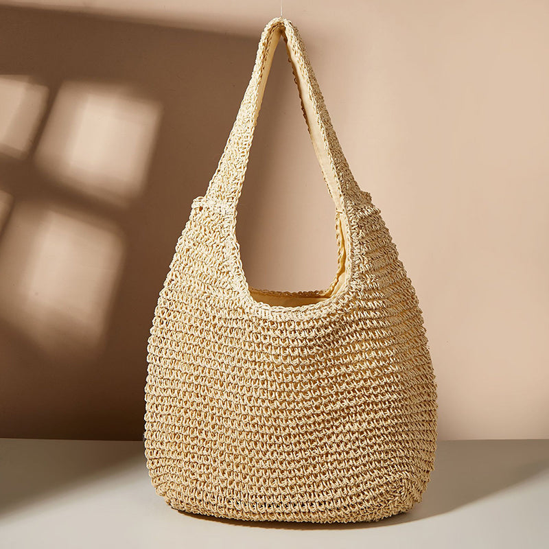 Ariella - Runde Tasche aus Stroh für den Sommer