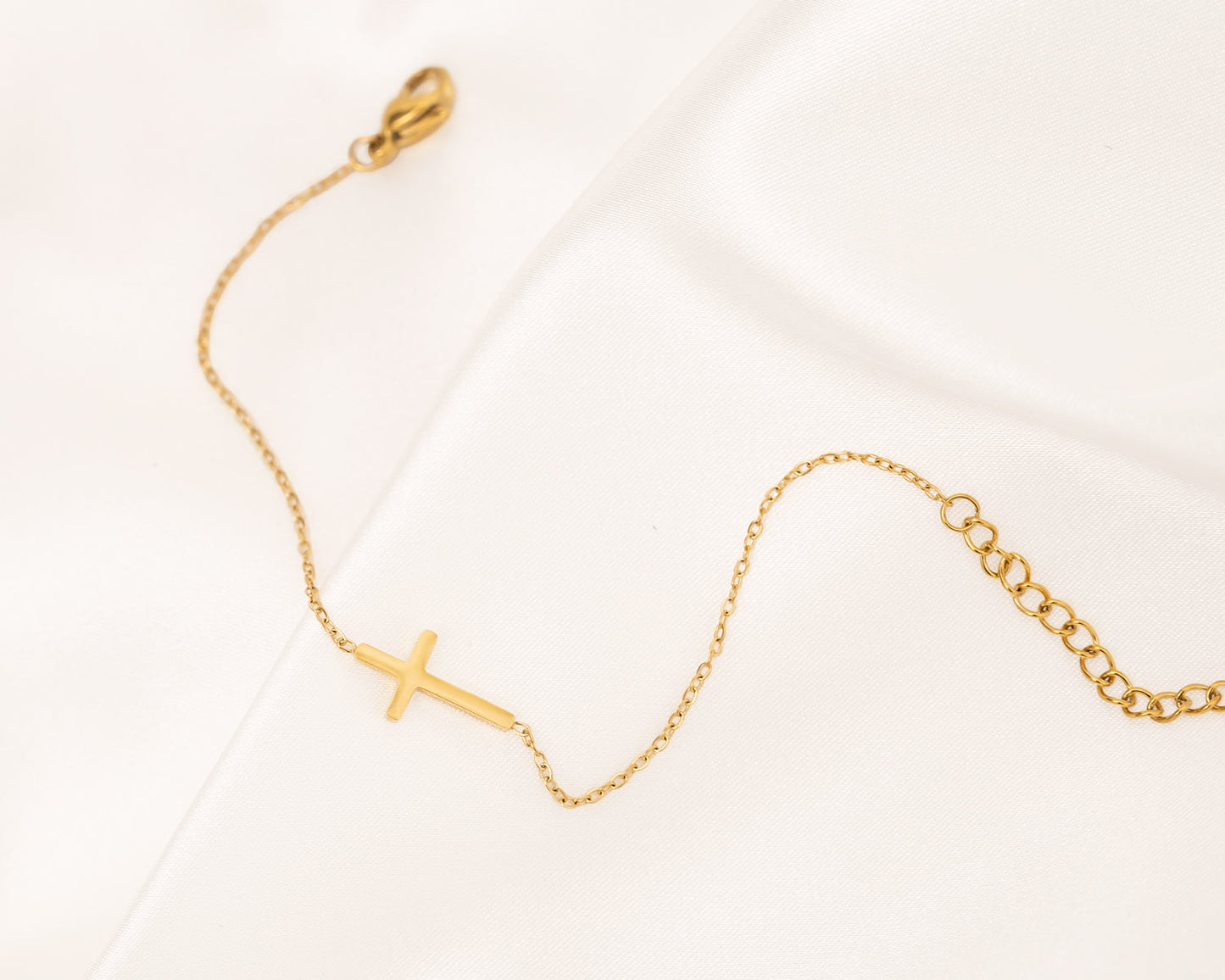Kreuz-Armband aus Gold und Silber