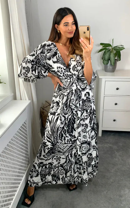 Langes Kleid mit V-Ausschnitt und Blumenprint in Blau und Weiß