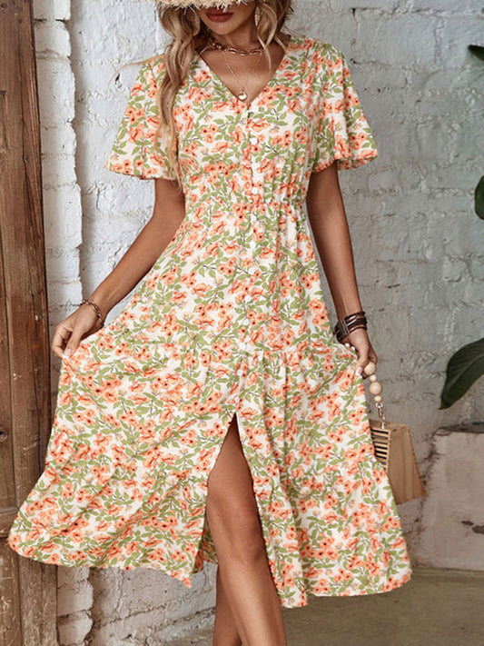 Damenkleid mit Knopfverschluss und Blumendruck