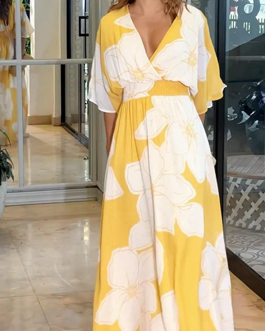 Maxikleid mit Blumenmuster und Fledermausärmeln