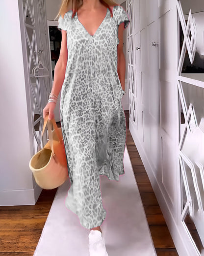 Langes Kleid mit V-Ausschnitt und kurzen Ärmeln