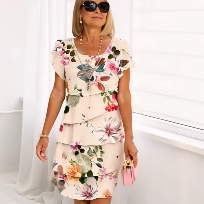 Langes Kleid mit Blumendruck und fließendem Saum