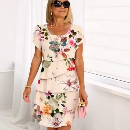 Langes Kleid mit Blumendruck und fließendem Saum