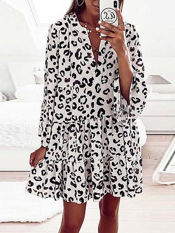 -Kleid mit Print, langen Ärmeln und weitem V-Ausschnitt