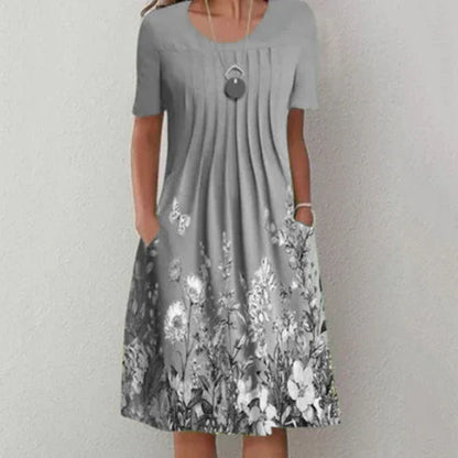 Marlene - Plissiertes Minikleid mit floralem Muster