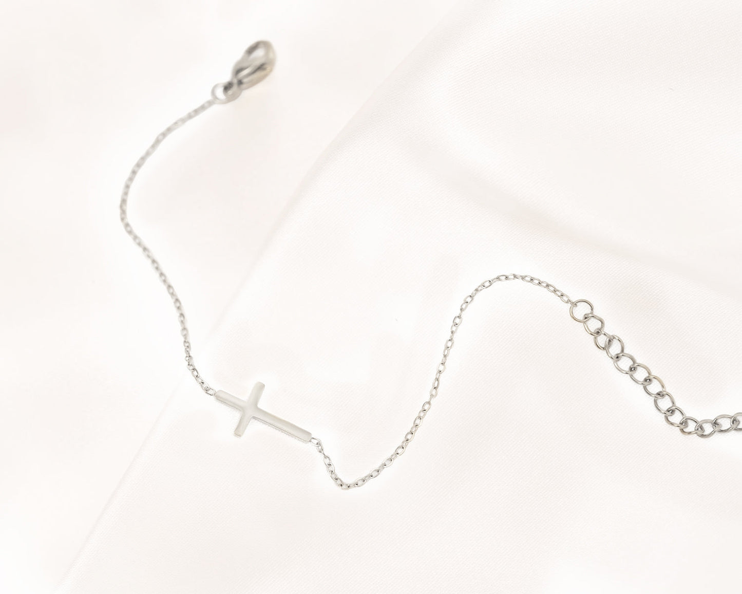 Kreuz-Armband aus Gold und Silber